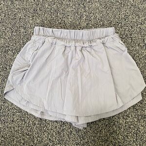 Gray Woman’s Athletic Skort with spandex under layer sports gym outfit